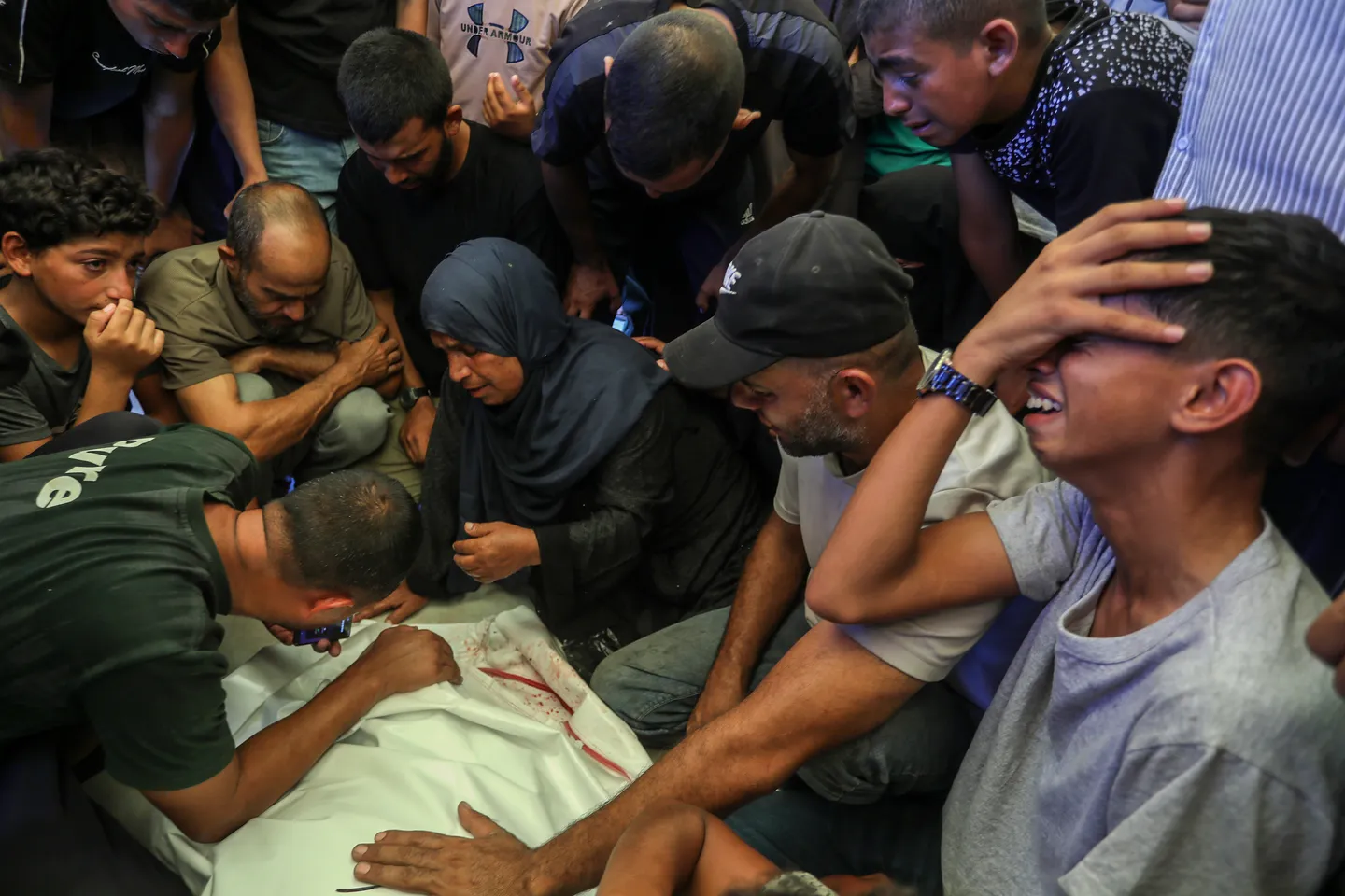 Israeli strikes kill 13 in Gaza, including child, medics say