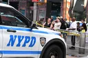 Woman stabs 2, killing one, in Times Square before being shot dead by police