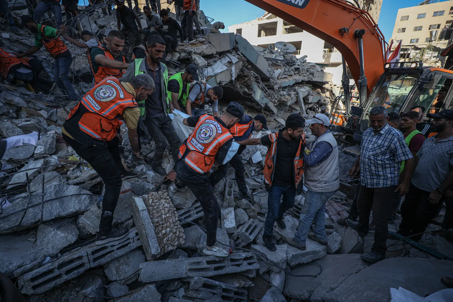 Gaza building damaged by Israeli strikes collapses, killing 11, including 5 children