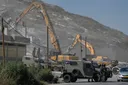 Israel detains 14 Palestinians, demolishes three homes in occupied West Bank