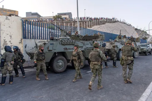 Migrant death toll rises to 19 as thousands cross into Spain's Ceuta enclave
