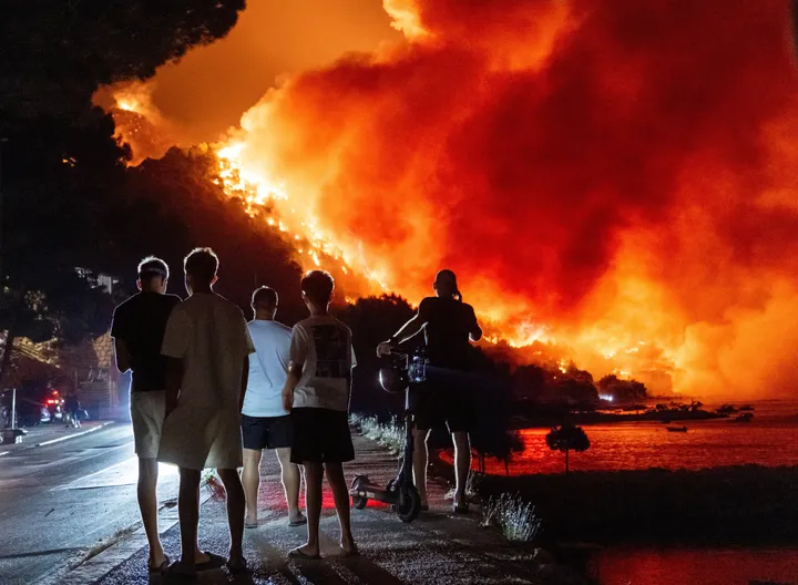 Why Europe's summer holiday is becoming a season of evacuation