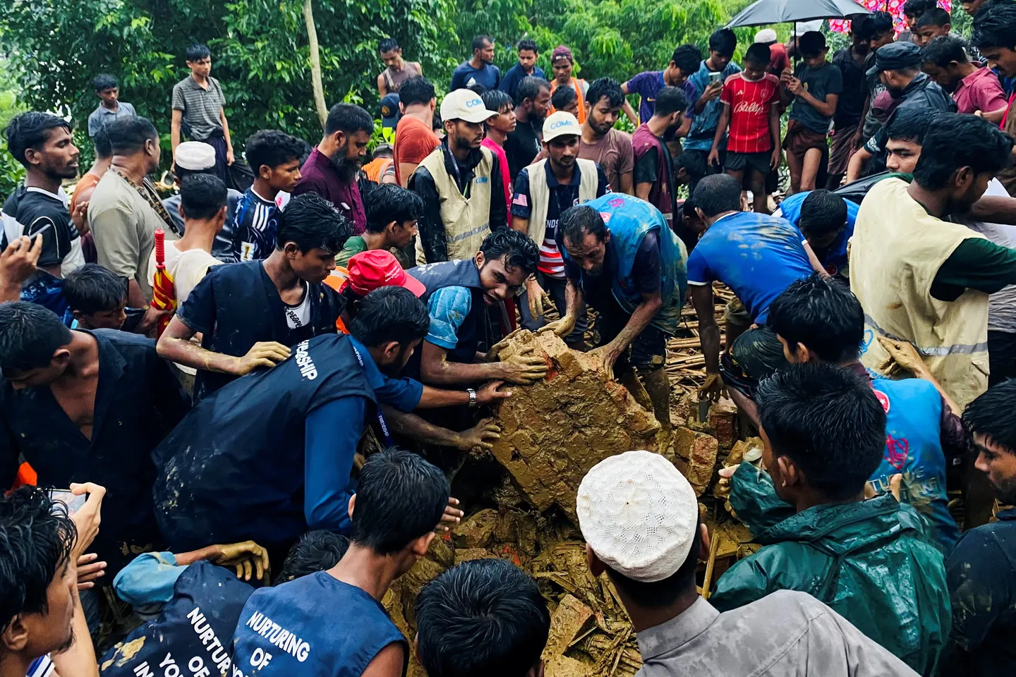 Bangladesh relocates Rohingya refugees after landslide kills at least 13 people