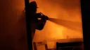 Fire at China shoe factory kills dozens, many feared trapped