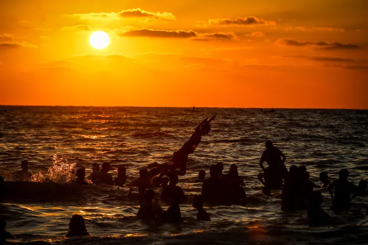 In pictures: Gaza's families find a moment to breathe by the sea amid the ruins
