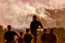 Wildfires force illegal settlers to evacuate occupied West Bank settlement