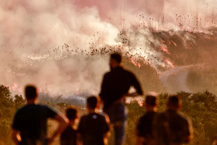 Wildfires force illegal settlers to evacuate occupied West Bank settlement