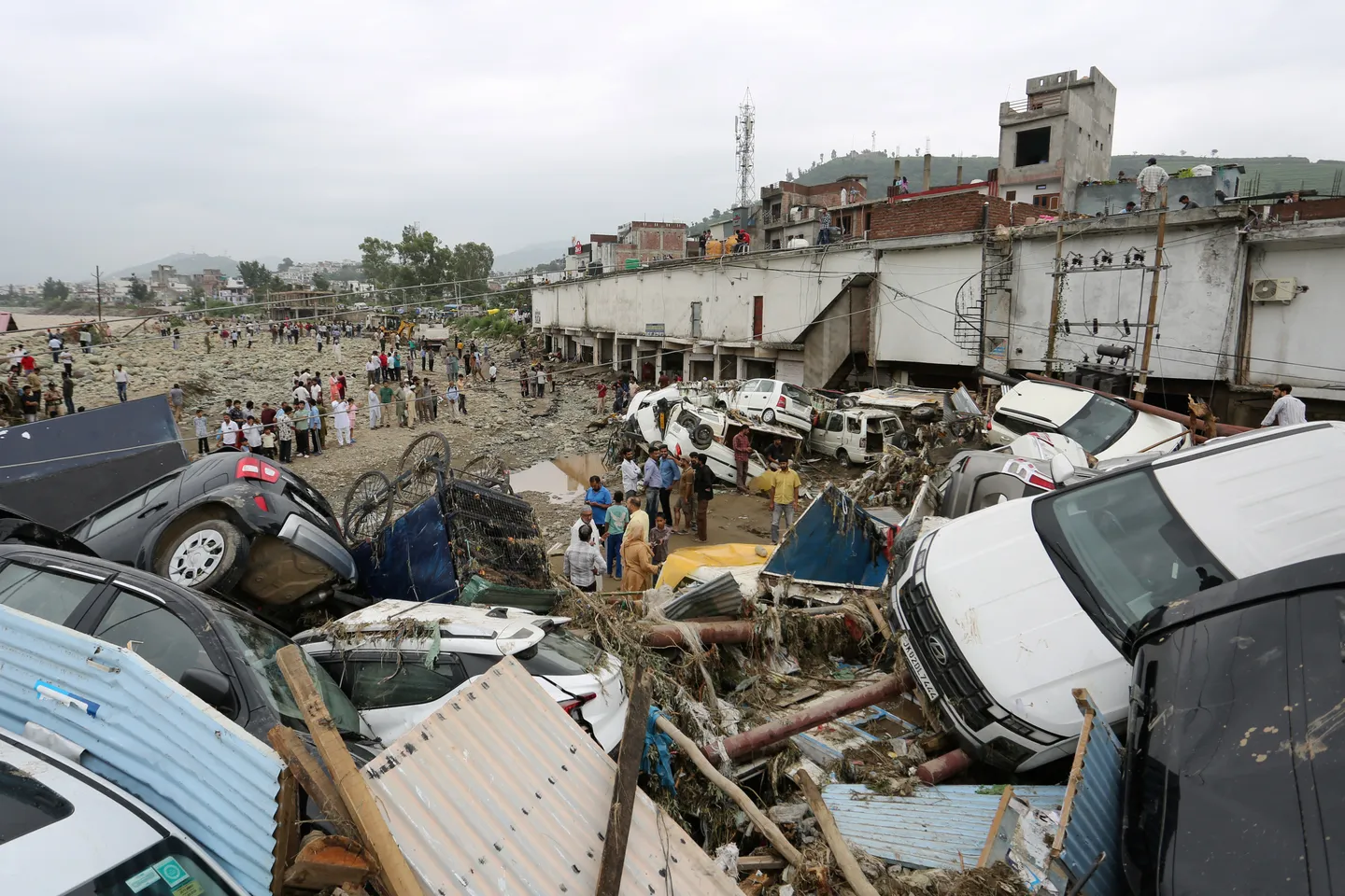 Deadly flash floods, landslides hit Indian-administered Kashmir