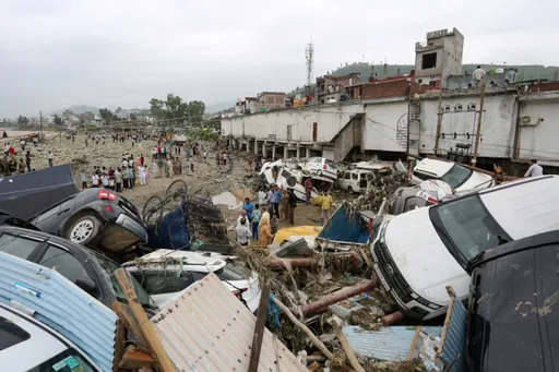 Deadly flash floods, landslides hit Indian-administered Kashmir