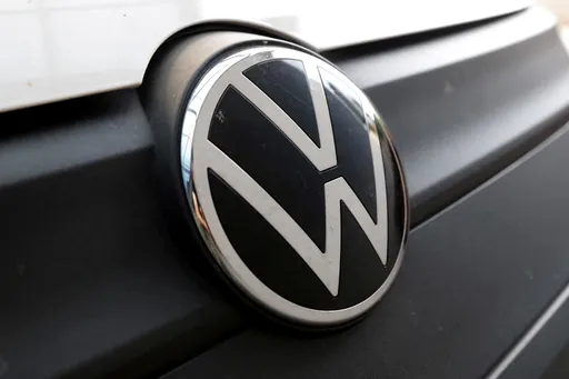 Volkswagen profit plunges as carmaker weighs mass job cuts