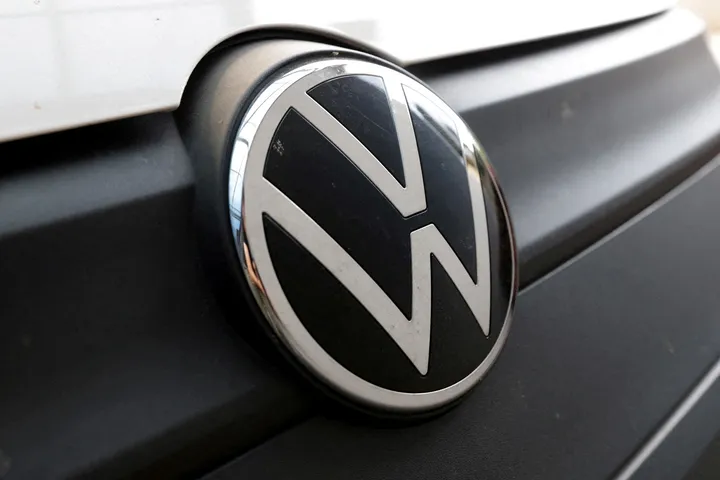 Volkswagen profit plunges as carmaker weighs mass job cuts