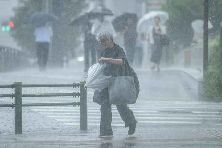 Central Tokyo lashed with record 34 straight days of rain