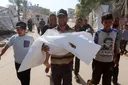 Israeli air strikes kill eight more Palestinians in Gaza in latest violation of ceasefire deal