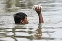 12 killed, 8 missing in Philippines after floods, landslides
