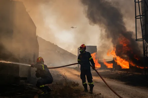 Strong winds fuel new wildfire near Athens, evacuation ordered