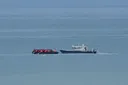 Small boat carrying record 230 migrants crosses English Channel to UK