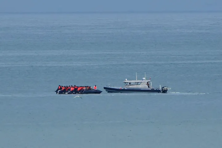 Small boat carrying record 230 migrants crosses English Channel to UK