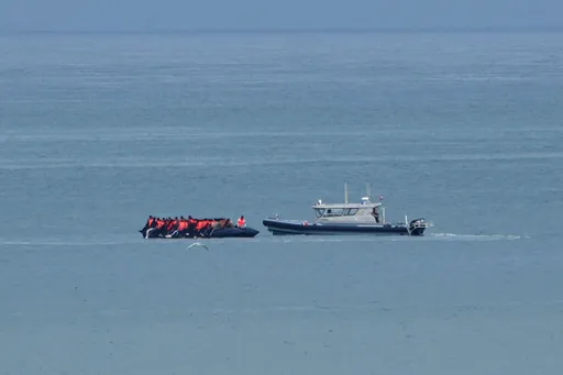 Small boat carrying record 230 migrants crosses English Channel to UK