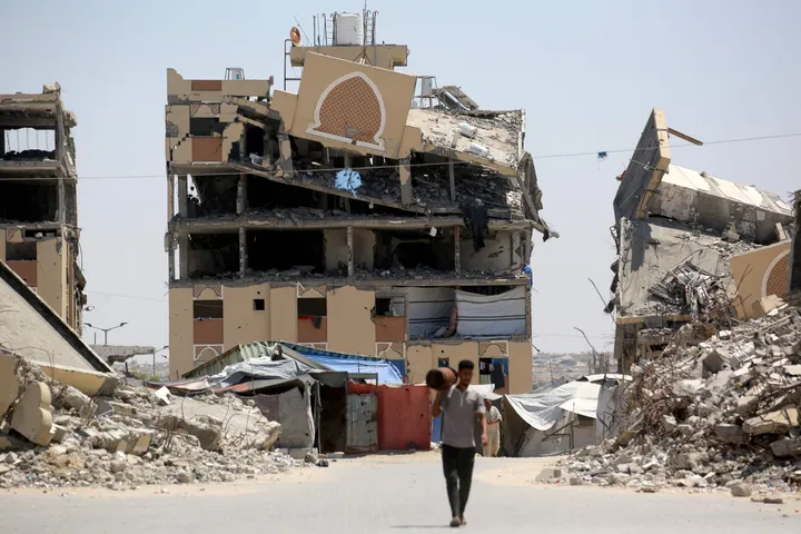 Gaza rescuers retrieve bodies from ruins of home destroyed early in war