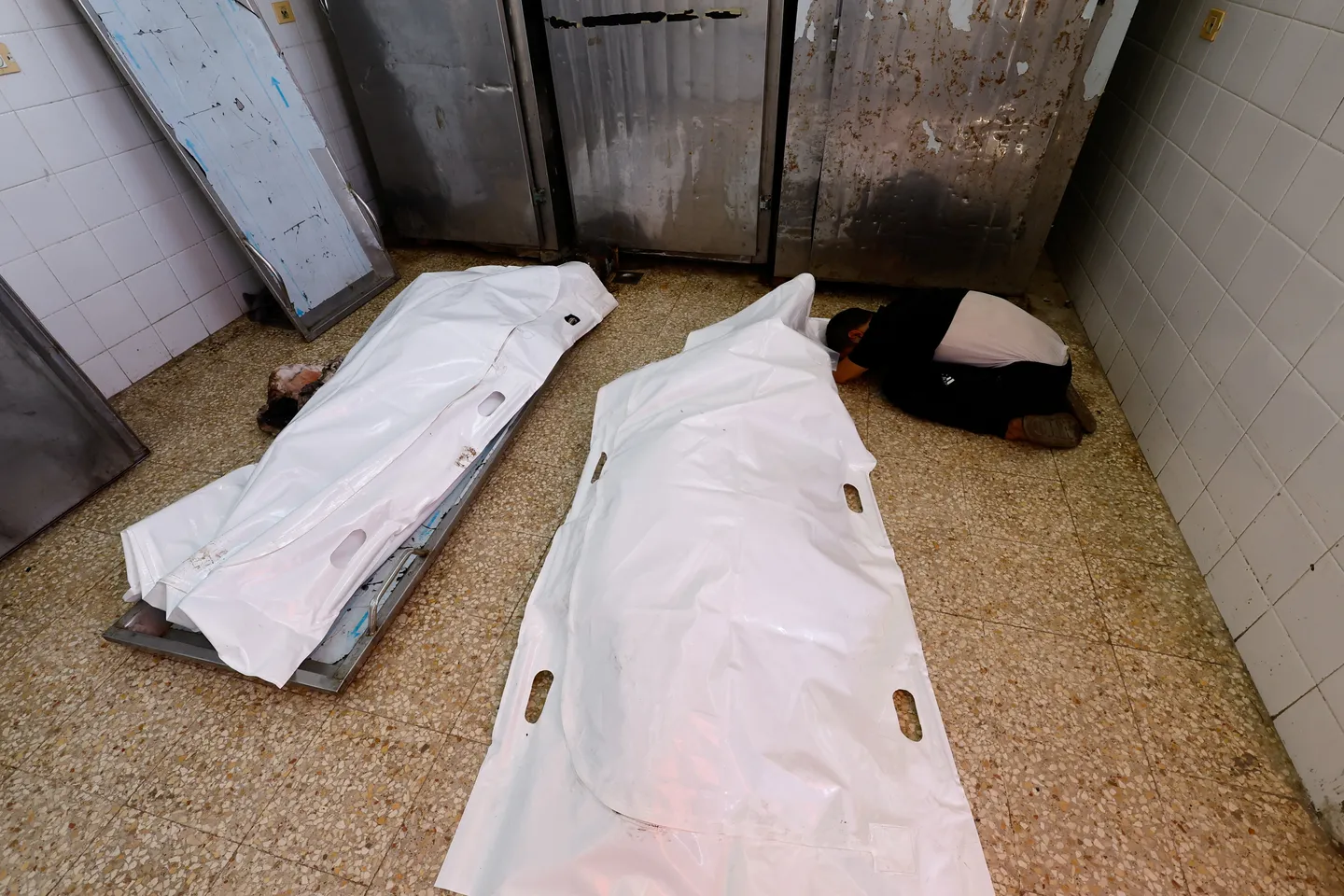 Remains of 21 Palestinians retrieved from homes destroyed during Israel’s genocidal war