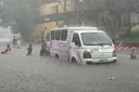 At least 23 killed as monsoon rains, cyclones hit Philippines