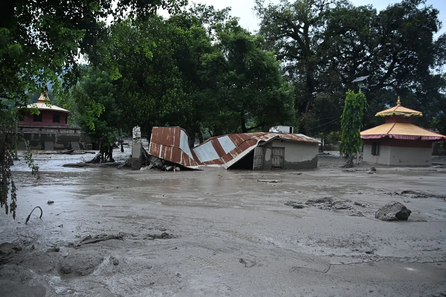 What triggered deadly floods near Nepal-China border?