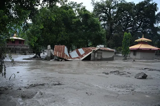 What triggered deadly floods near Nepal-China border?