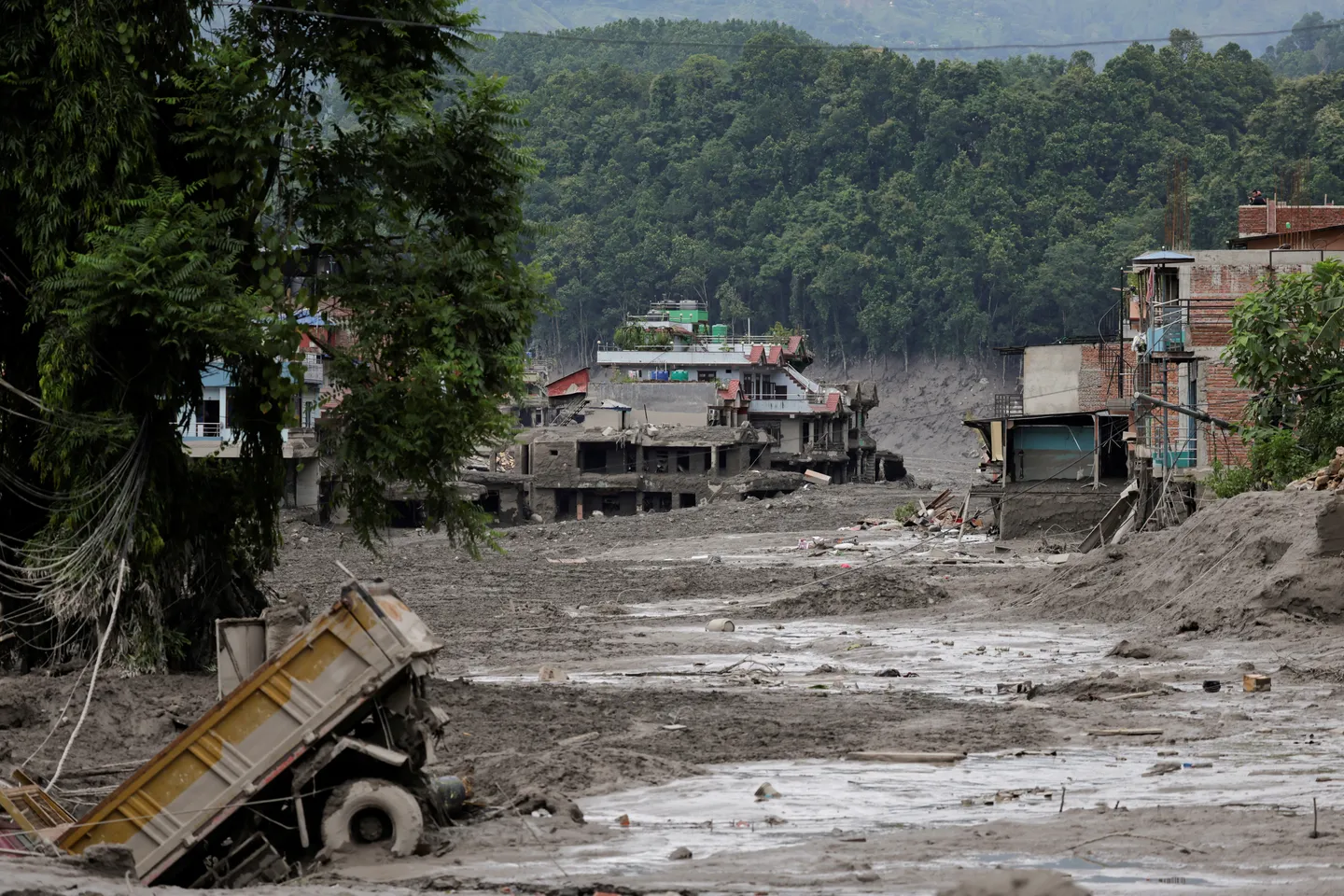 Nepal floods, mudslides kill dozens, leave hundreds missing near China border