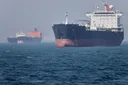 Iran's IRGC warns shipping companies after two oil tankers hit mines in Strait of Hormuz