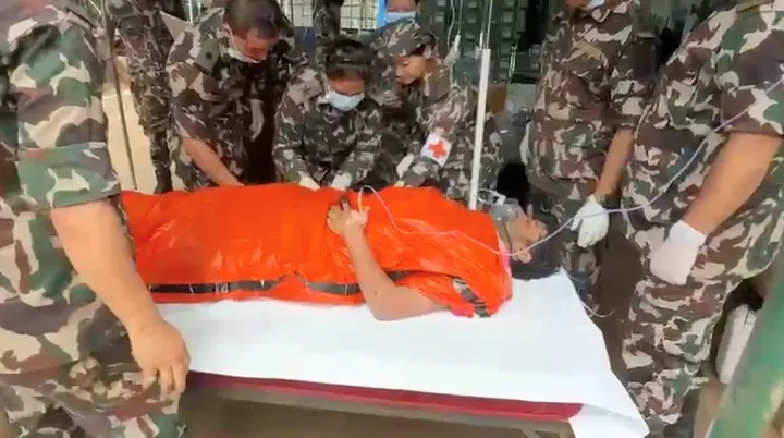 Two people rescued alive from Nepal tunnel more than a week after flash floods