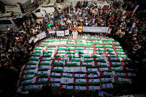 Gaza mourns 100 Palestinians, including 60 children, recovered from rubble