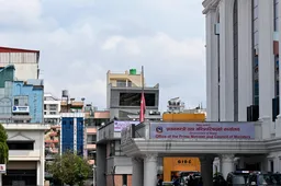 Nepal mourns flood victims as hopes persist for workers trapped in tunnels
