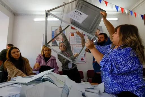 Russia reports mass attacks on election systems amid Duma voting