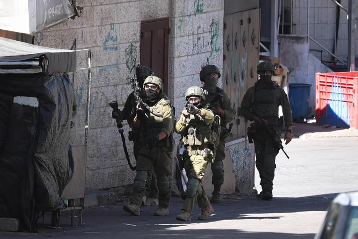 Israeli forces arrest elderly Palestinians as settlers attack towns across occupied West Bank