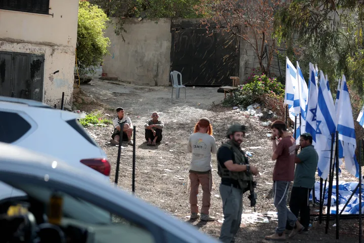 Illegal Israeli settlers attack Palestinian olive farmers, burn and uproot trees