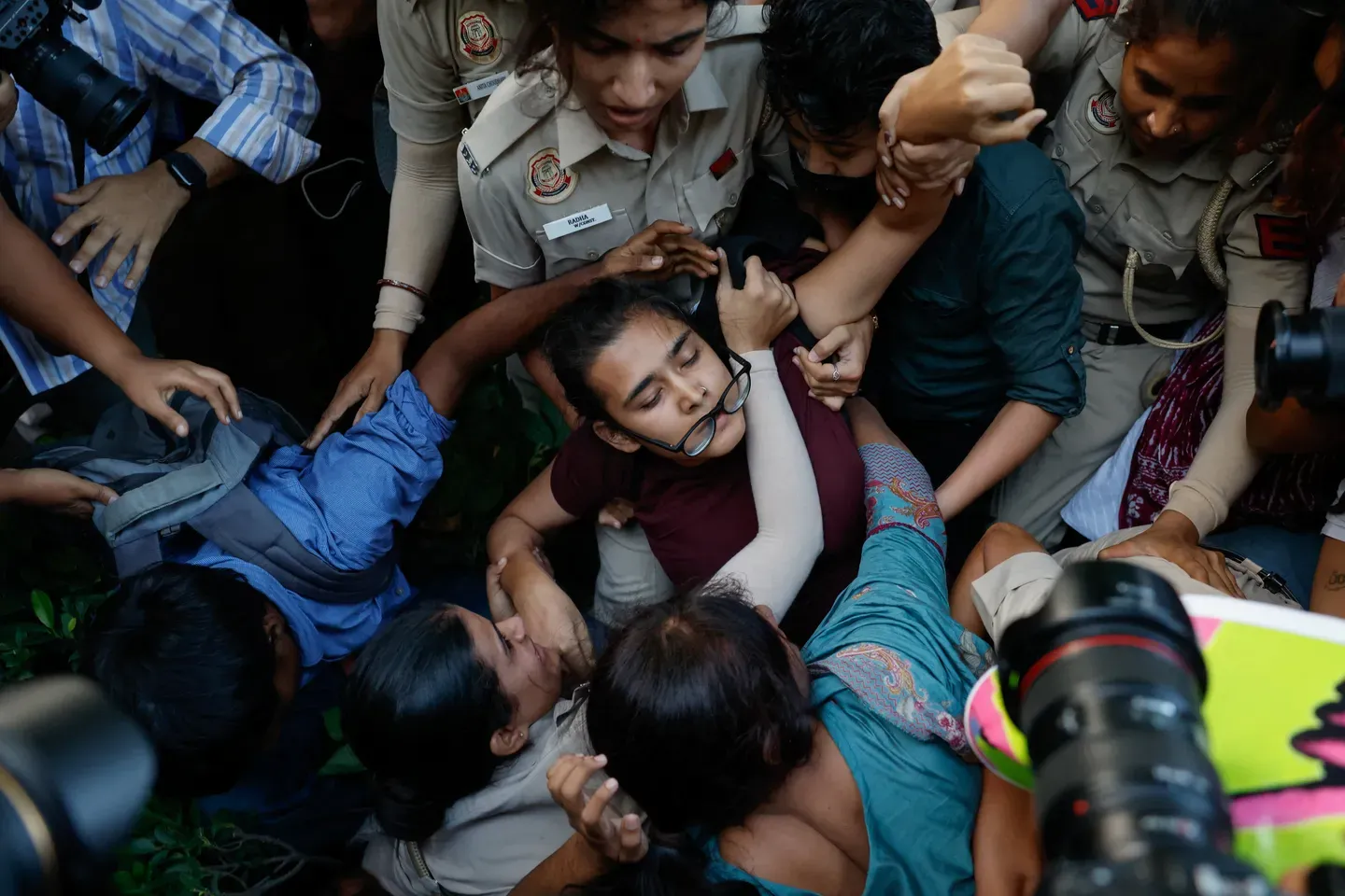 India cracks down on protesters demanding resignation of poll chief
