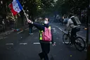 Far right blames migrants for France unrest, but look at these photos