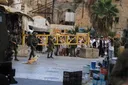 Israeli forces detain two men, fire tear gas to children during occupied West Bank raids