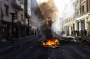 Paris erupts again as police clash with protesters and new looting hits France