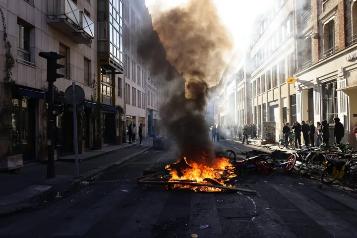 Paris erupts again as police clash with protesters and new looting hits France