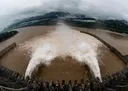 Protesters in India torch buildings, clash with police over Himalayan mega-dam