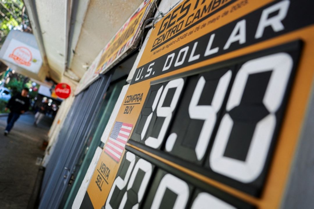 Irani  Teherani dhe Bagdadi të përdorin monedhat kombëtare për të goditur dollarin