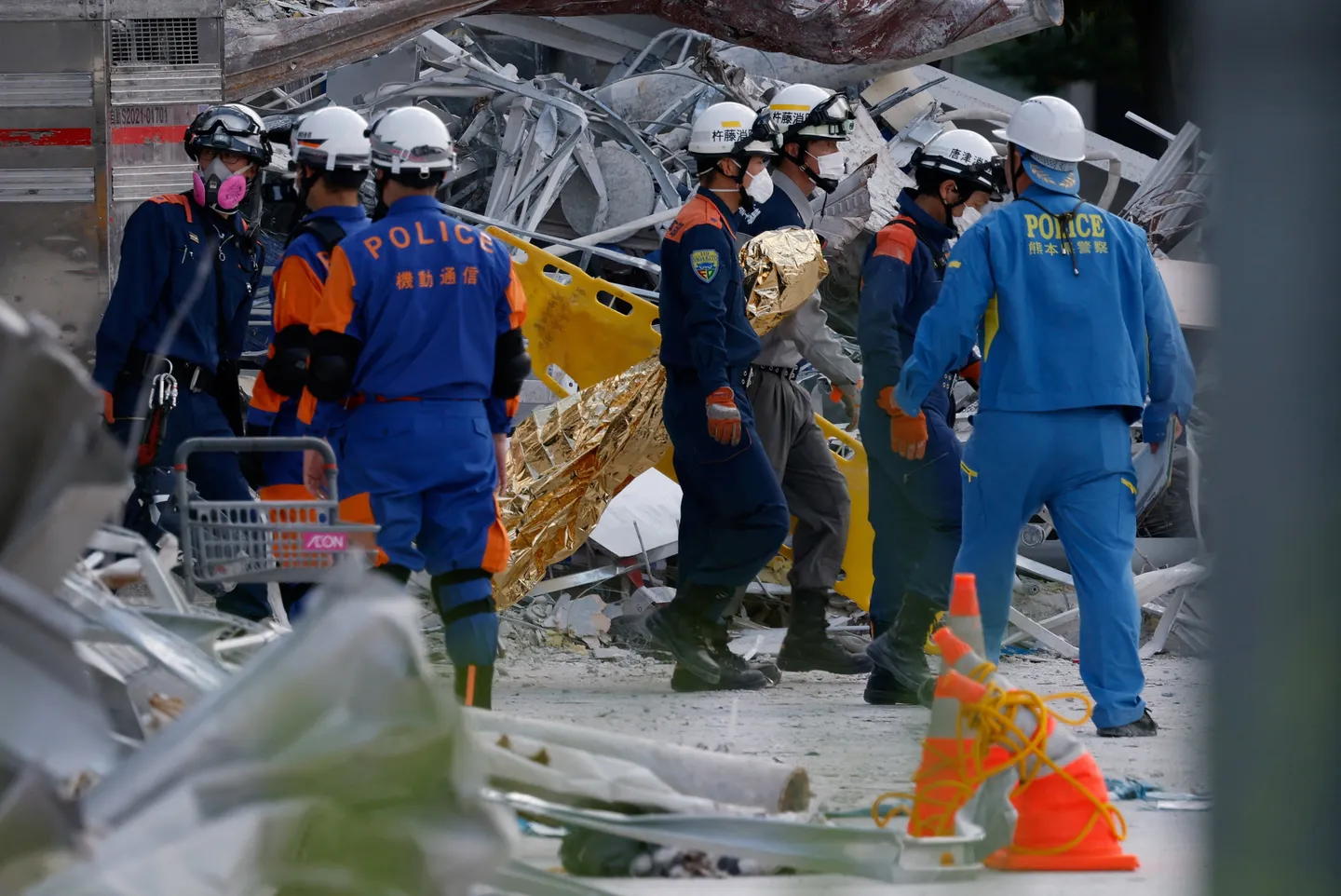 Japan earthquake death toll rises to 30 as rescuers race to find survivors at collapsed mall
