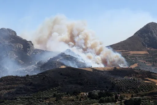 Greek firefighters battle wildfires as Crete blaze causes widespread damage