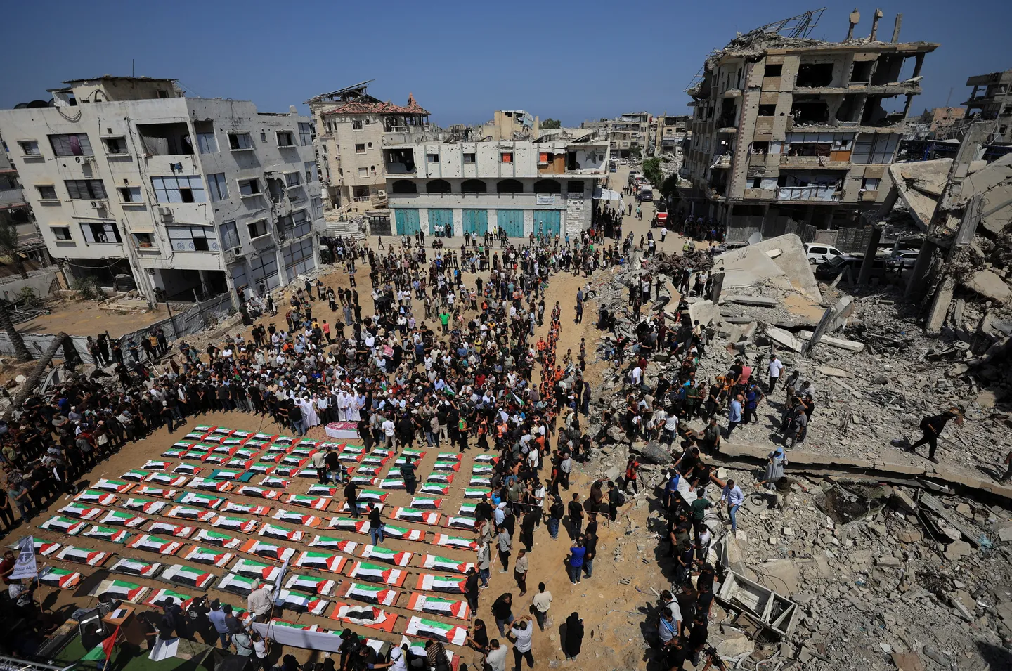 Thousands in Gaza attend funeral for 112 Palestinians recovered from rubble