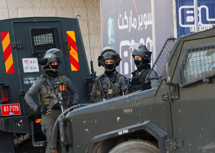 Israeli forces raid occupied West Bank refugee camp, impose curfew and halt prayers