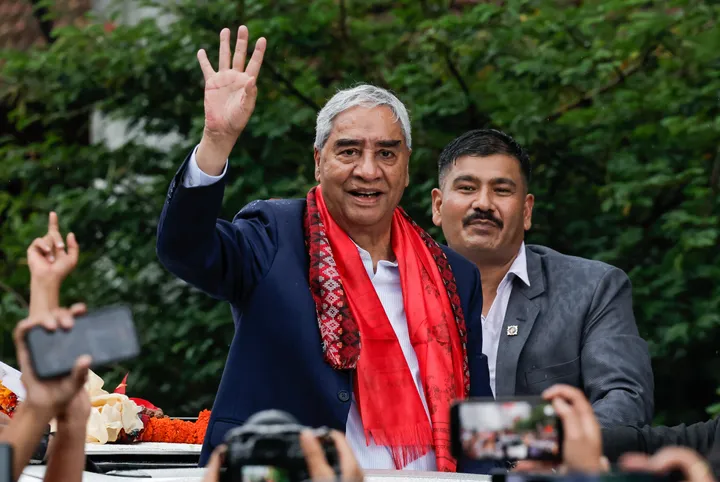 Nepal's ex-PM Deuba returns home to face graft probe