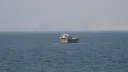 Vessel struck by unknown projectile in Strait of Hormuz
