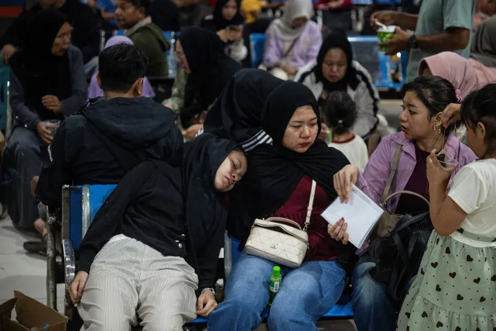 Search under way for scores missing after Indonesia ferry capsizes