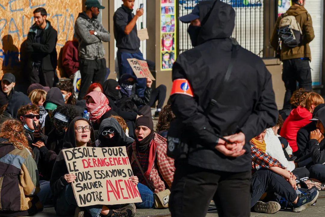 België beschuldigt extreemlinkse radicalen ervan jonge relschoppers aan te sturen